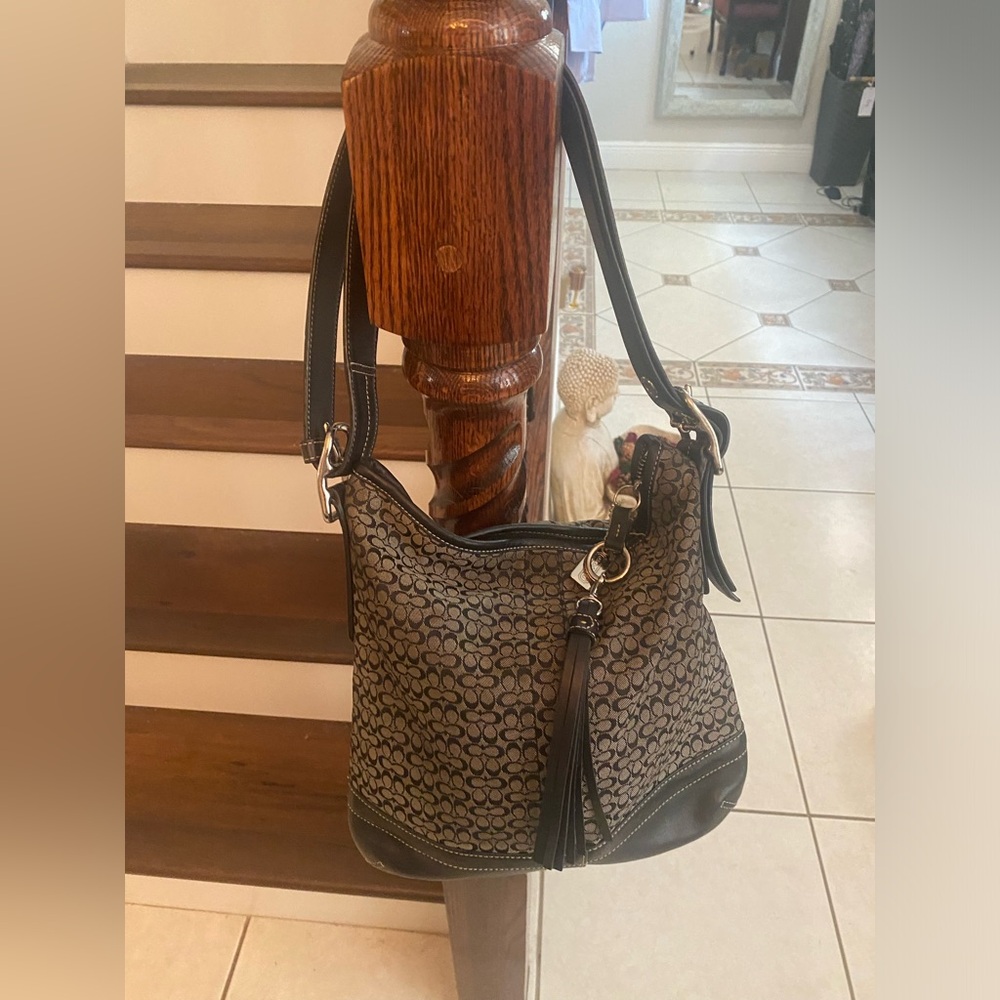 Vintage coach purse. Was loved and needing a new home.